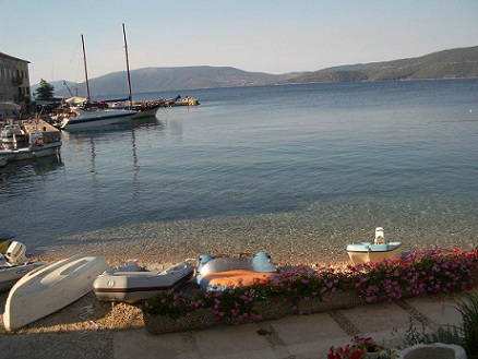 Small beach in front of apartment